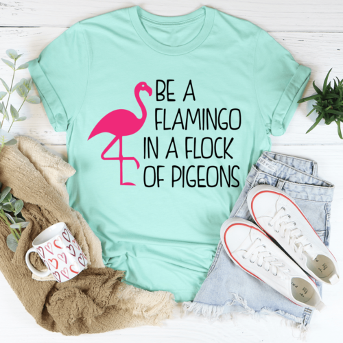 be-a-flamingo-in-a-flock-of-pigeons-tee